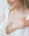 Delicate gold white pearl necklace