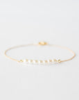 Delicate Gold White Pearl Bracelet