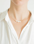 Delicate gold white pearl necklace