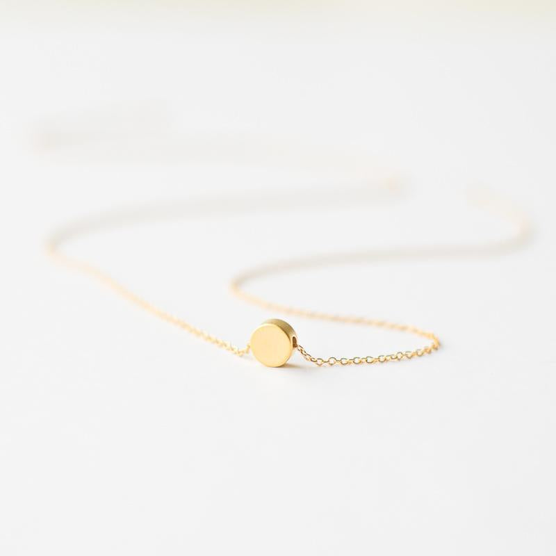 Geometric gold dot necklace