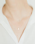 Geometric gold dot necklace